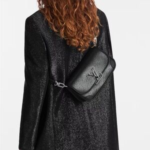 Louis Vuitton buci black bag like new. Used a few times